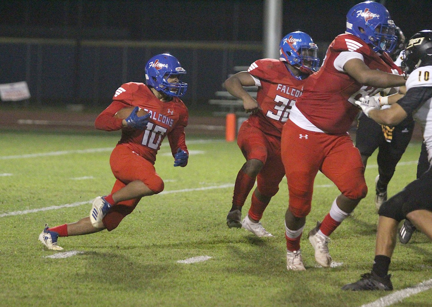 Falcon sophomore running back Derrick Gates hits the line against Sealy in the first district game of the season on Oct. 9, 2020 in Brookshire. Gates caught Royal’s lone score from quarterback Andre Prophet in the fourth quarter.